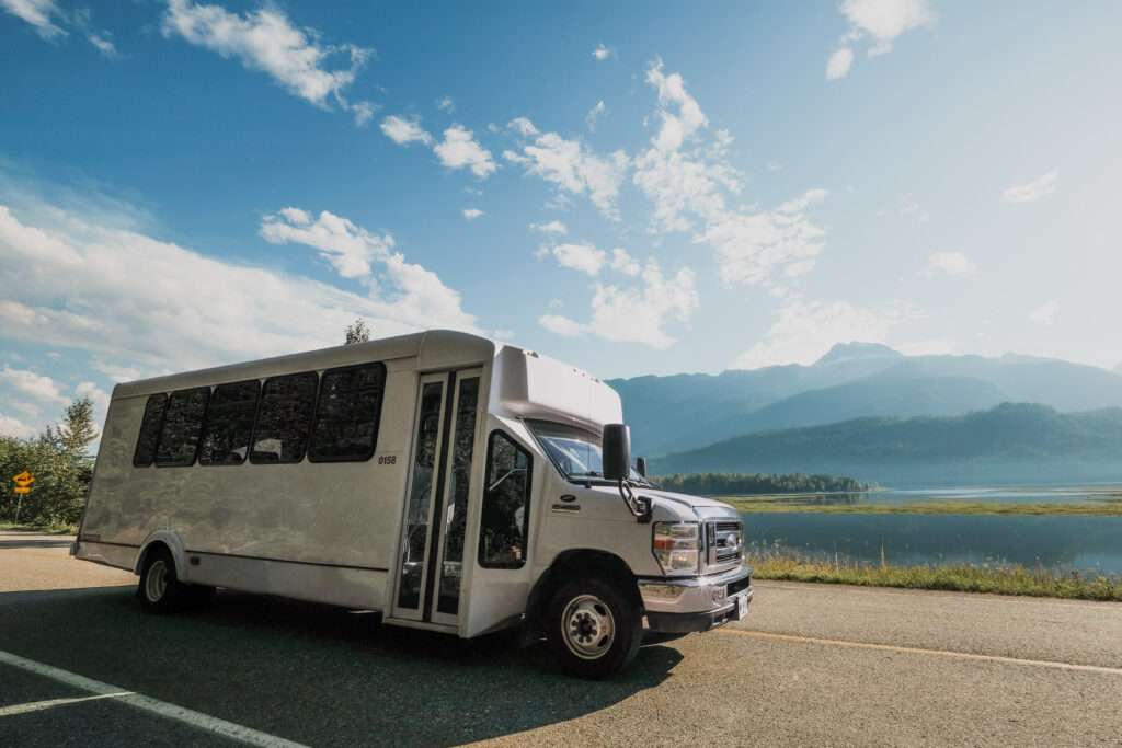 Revelstoke Transfers Mini Bus driving passengers between Revelstoke and other destinations