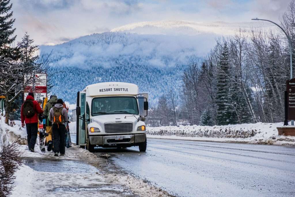 Revelstoke Transfers Resort Shuttle taking skiers between downtown and Revelstoke Mountain Resort